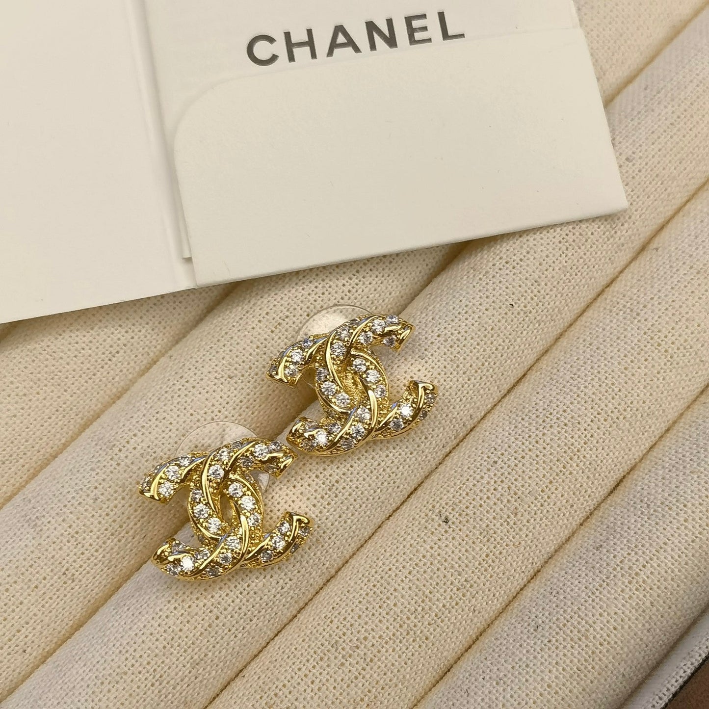 Sparkling Zircon Logo Stud Earrings