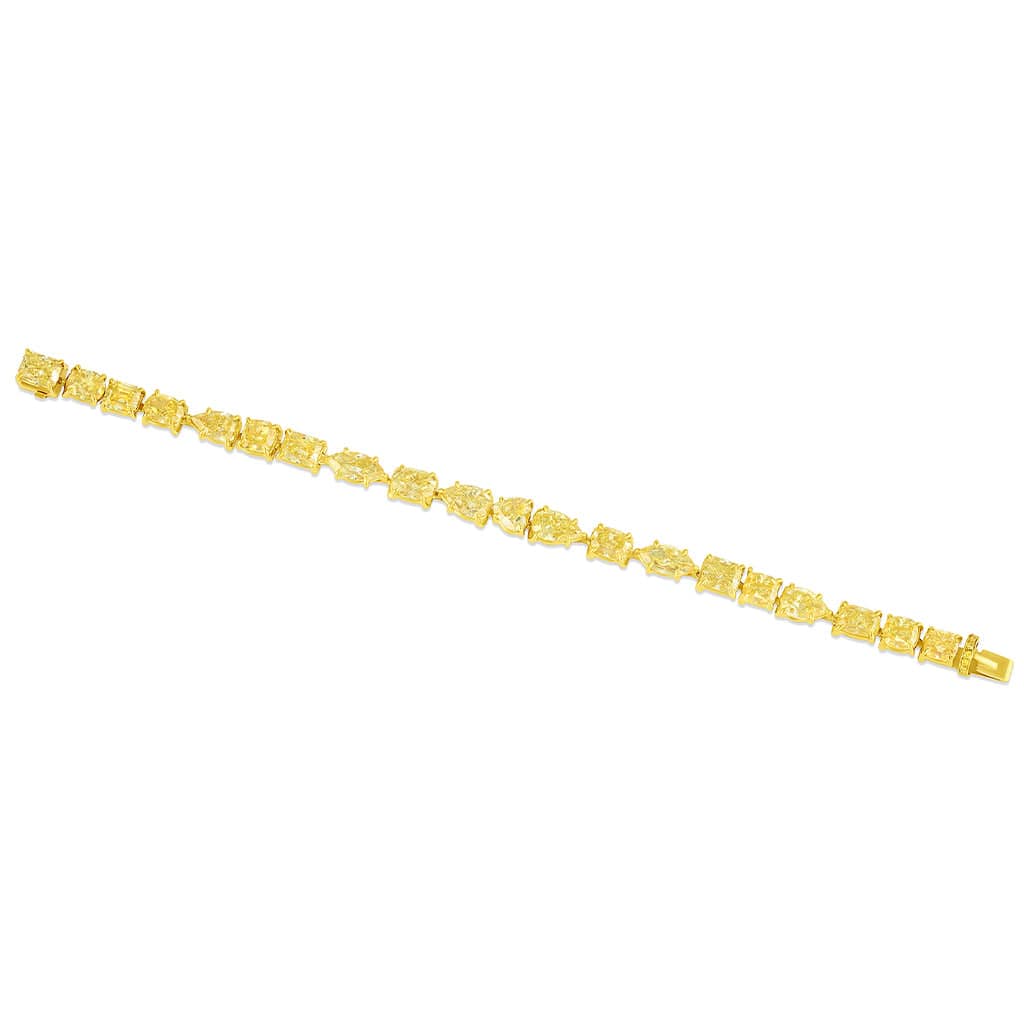 Rivière 18kt Yellow Gold Fancy Intense Yellow Diamond Multi-Shaped Bracelet, GIA Certified